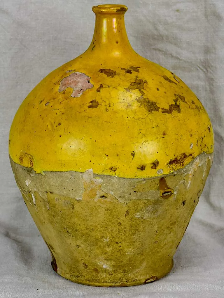 19th Century French water pitcher with yellow glaze