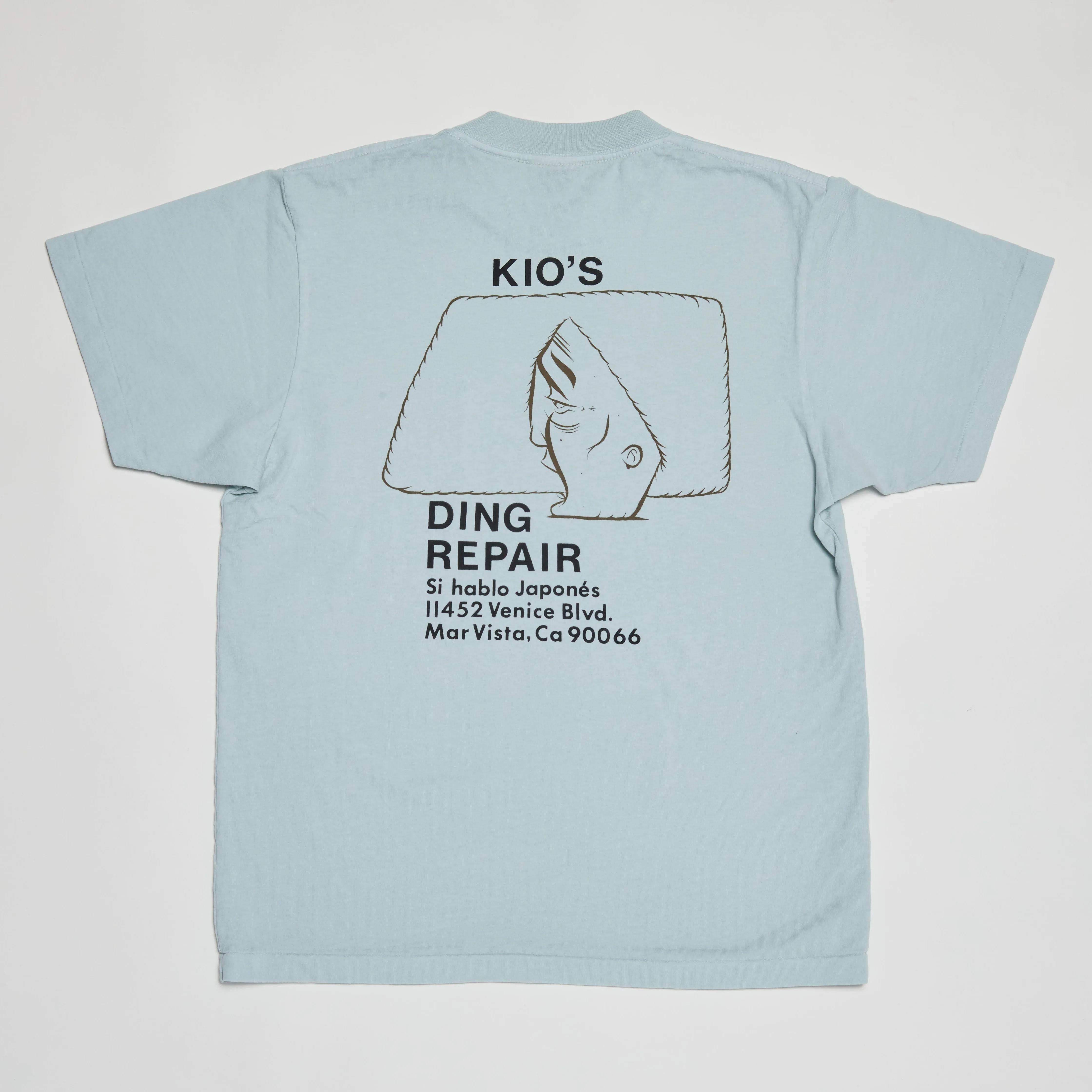 Kio’s Ding Repair 5th Generation T-Shirt (Dusty Blue)